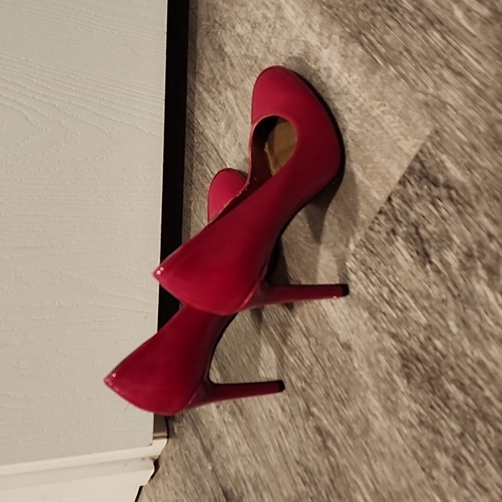 Red high heel pumps